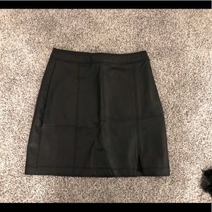 Black, faux leather skirt with side slit